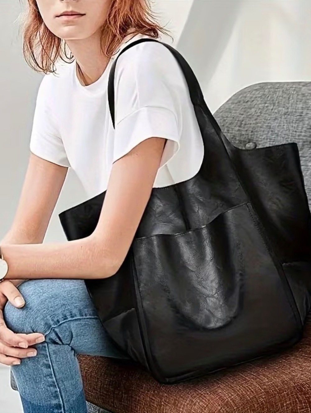 Black tote bag with front pocket